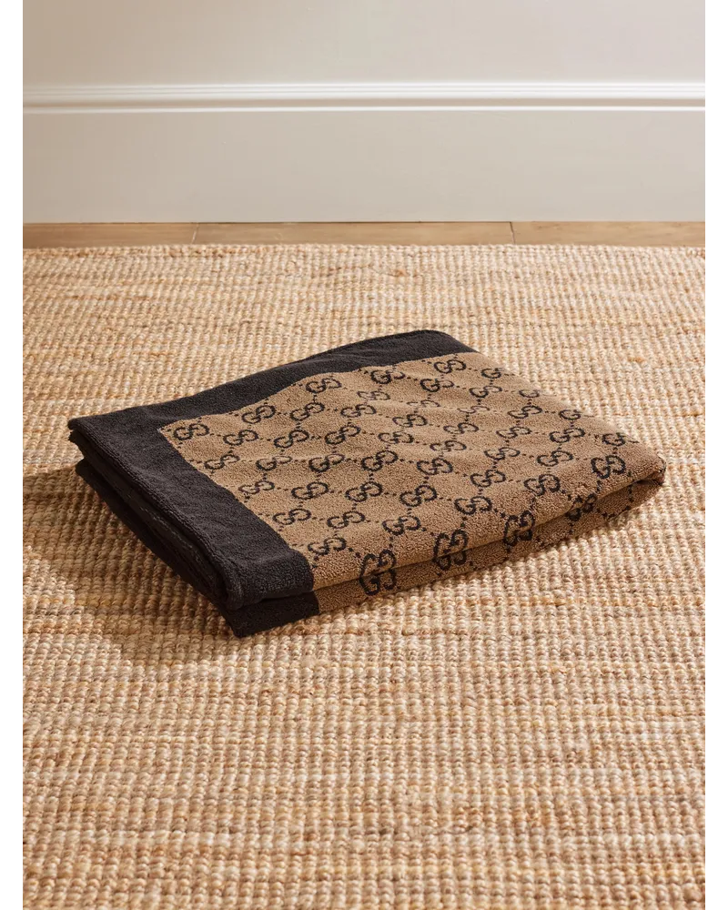 Gucci Strandtuch aus Baumwollfrottee mit Jacquard-Logomuster Braun