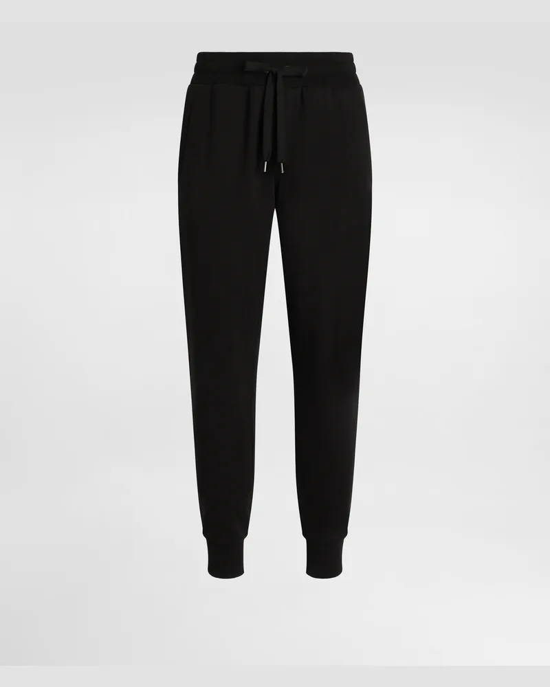 Dolce & Gabbana Jogginghose Aus Stretchjersey Mit Plakette - Mann Hosen Und Shorts Schwarz Schwarz