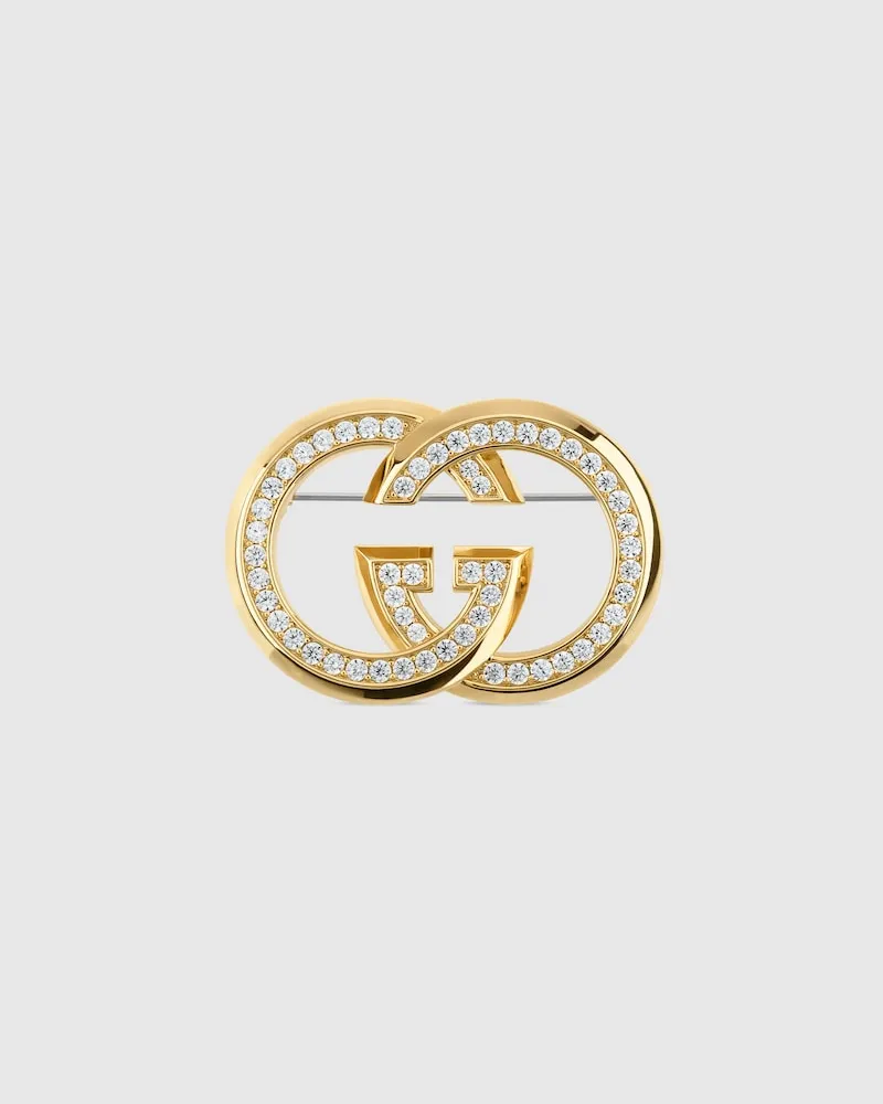 Gucci Interlocking Brosche mit Kristallen Goldfarbenes
