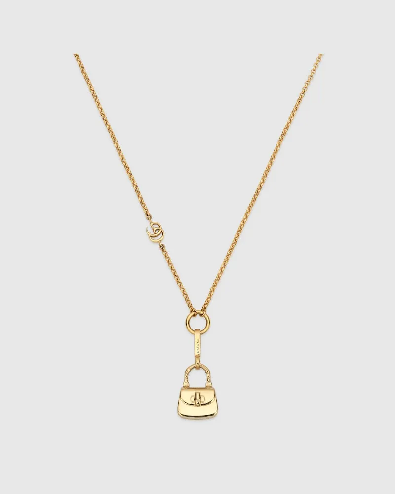 Gucci Gliederhalskette mit Taschen-Anhänger Goldfarbenes