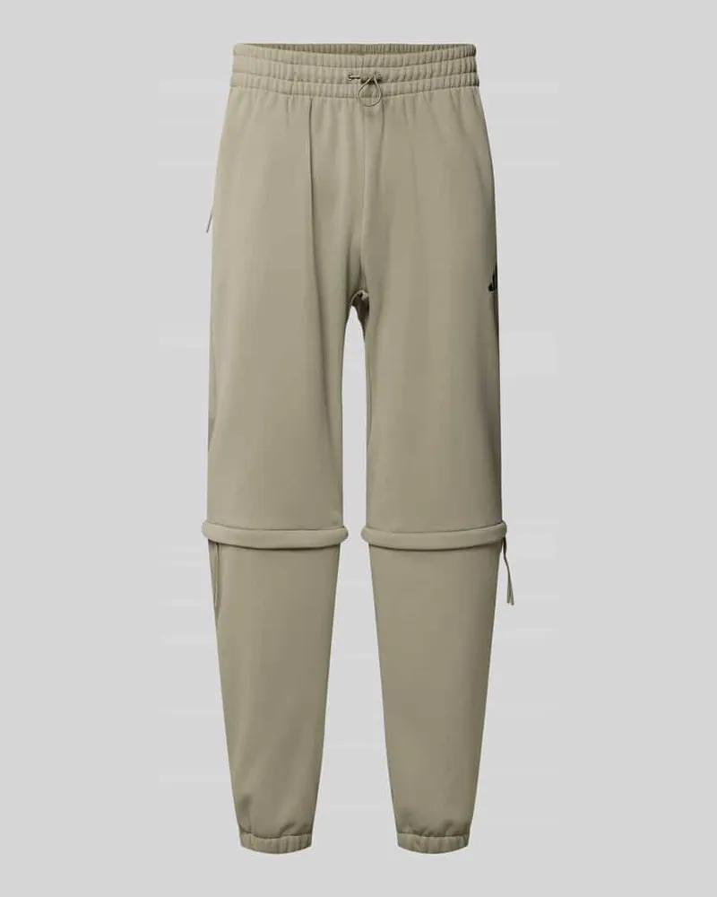 adidas Relaxed Fit Sweatpants mit Logo-Print Schilf