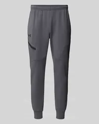 Under Armour Regular Fit Sweatpants mit Reißverschlusstasche Modell 'UNSTOPPABLE Anthrazit