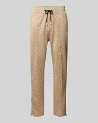 Guess Sweatpants mit Allover-Logo-Print Modell 'KORBIN Beige