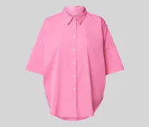 Bluse in unifarbenem Design