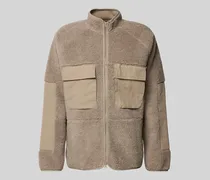 Jacke mit Teddyfell und aufgesetzten Pattentaschen