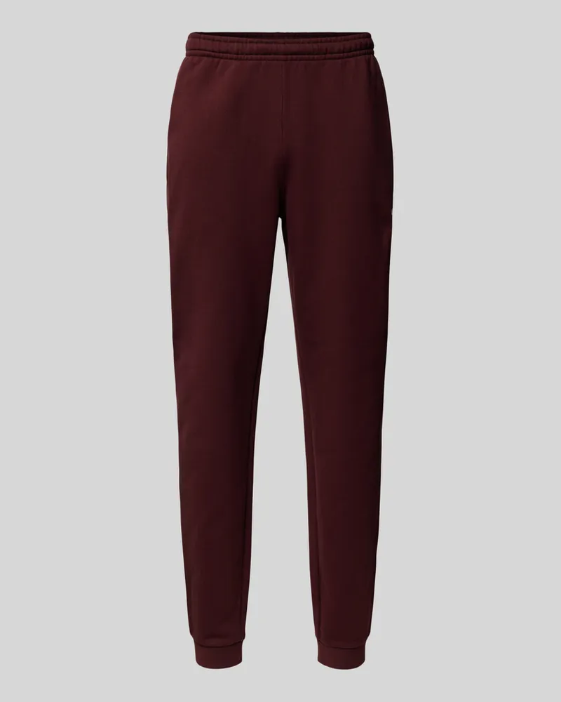 Lacoste Tapered Fit Sweatpants mit Label-Print Modell 'HERITAGE Bordeaux