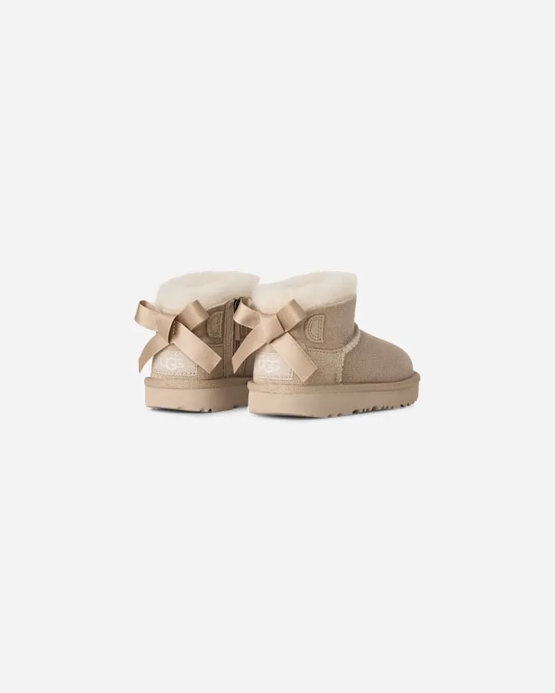 UGG Ultra Mini Bailey Bow Boot für Kinder in Beige, Größe Sand