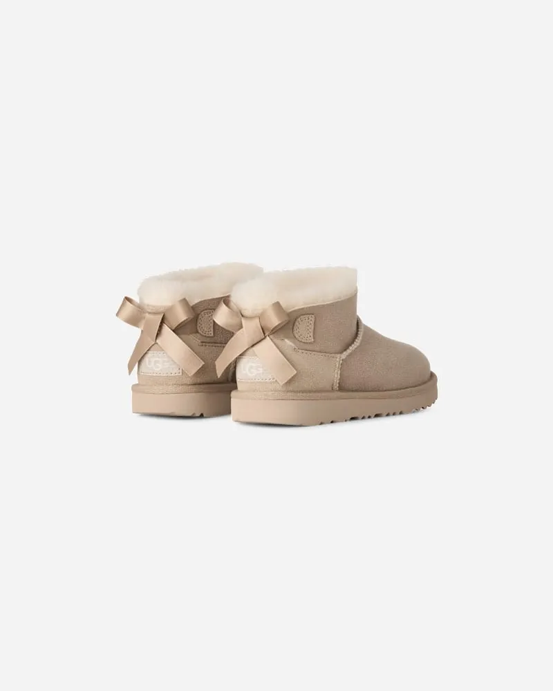 UGG Ultra Mini Bailey Bow Boot für Kinder in Beige, Größe Sand