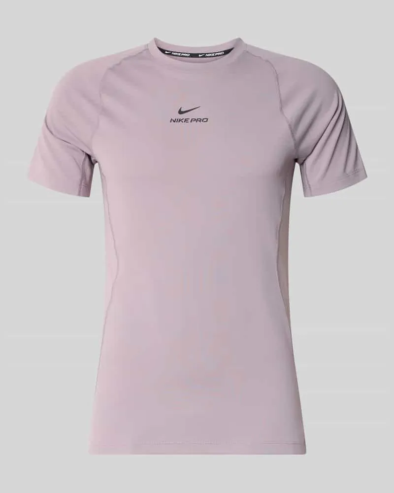 Nike T-Shirt mit Logo-Print und Raglanärmeln Lila