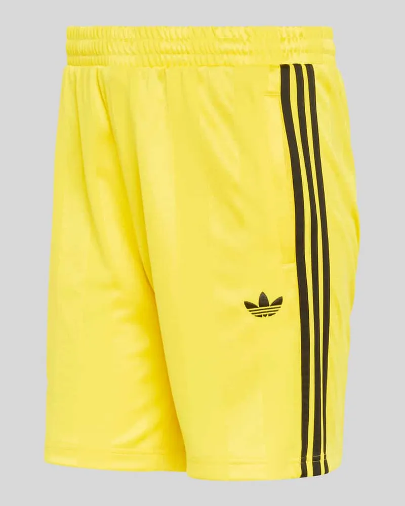 adidas Trainingsshorts mit Logo-Detail Gelb