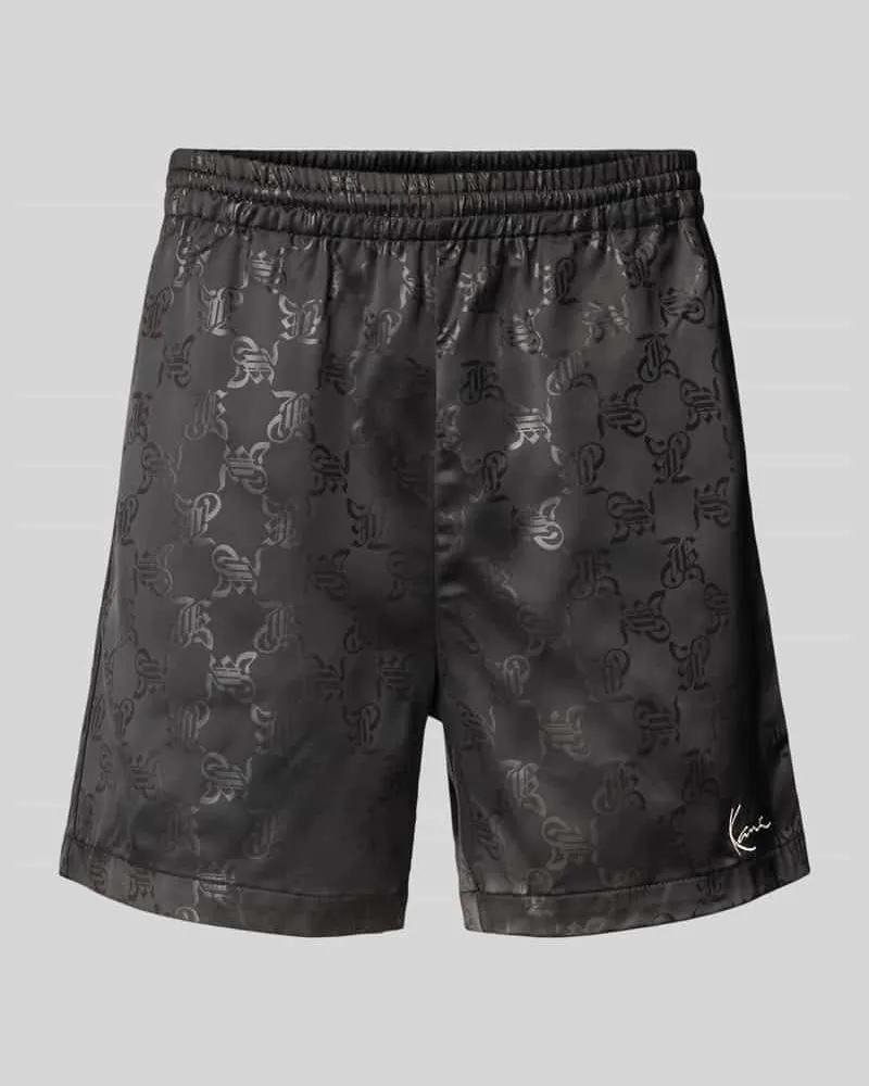 Karl Kani Relaxed Fit Shorts mit Allover-Logo-Print Modell 'Signature 
