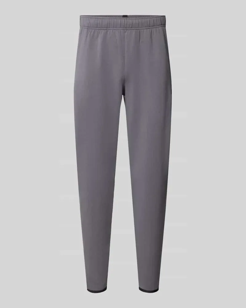 Under Armour Regular Fit Trainingshose mit Baumwoll-Anteil Modell 'Unstoppable Anthrazit
