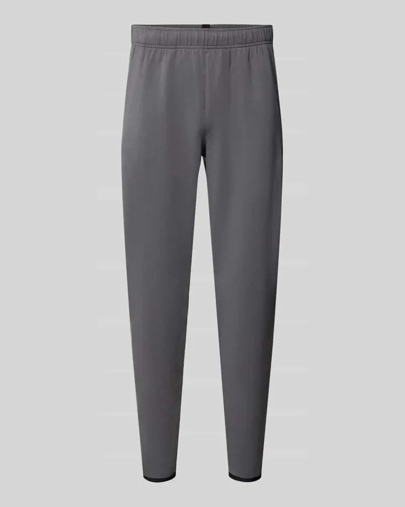 Under Armour Regular Fit Trainingshose mit Baumwoll-Anteil Modell 'Unstoppable Anthrazit