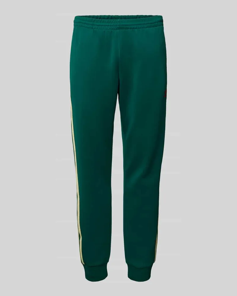 adidas Regular Fit Trainingshose mit labeltypischen Streifen 
