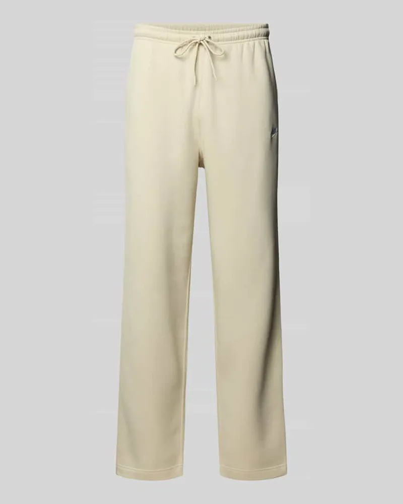 Nike Sweatpants mit Logo-Stitching und Eingrifftaschen Beige