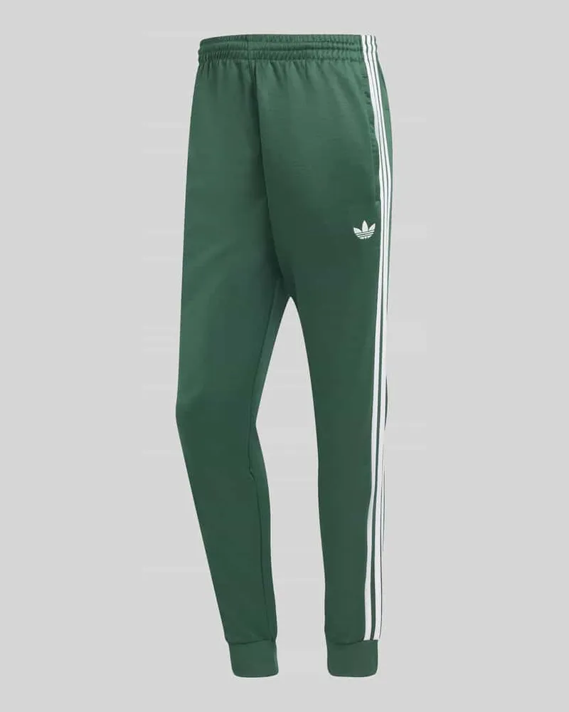 adidas Slim Fit Sweathose mit Kontraststreifen Dunkelgruen