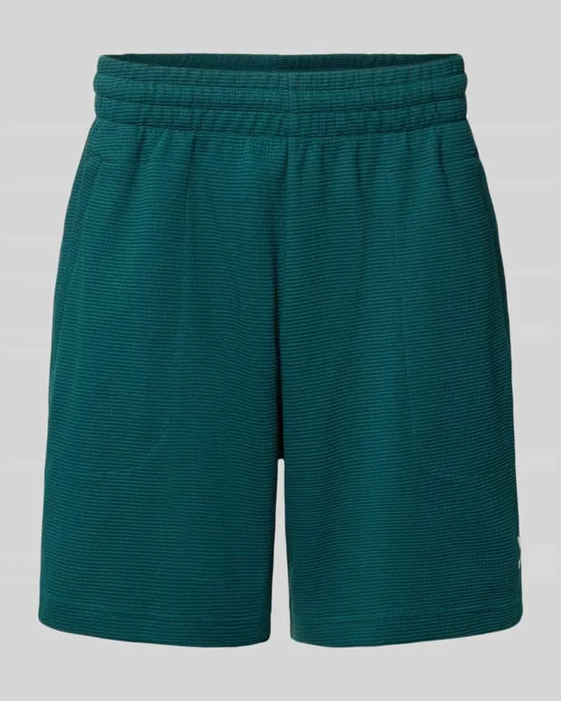 adidas Relaxed Fit Shorts mit Strukturmuster Dunkelgruen