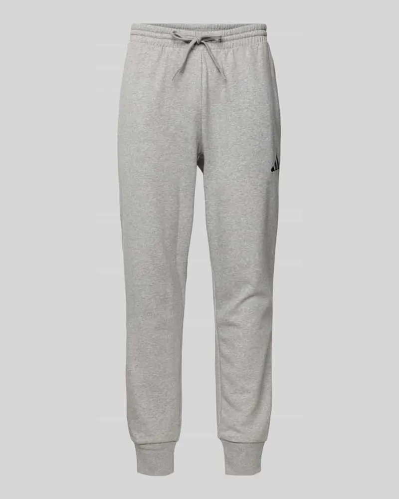 adidas Relaxed Fit Sweatpants mit Logo-Stitching 
