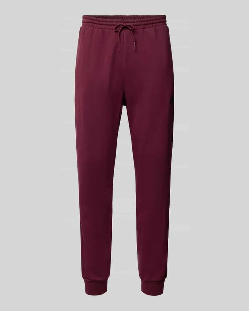 adidas Regular Fit Sweathose aus Baumwoll-Mix Modell 'FEELCOZY Dunkelrot