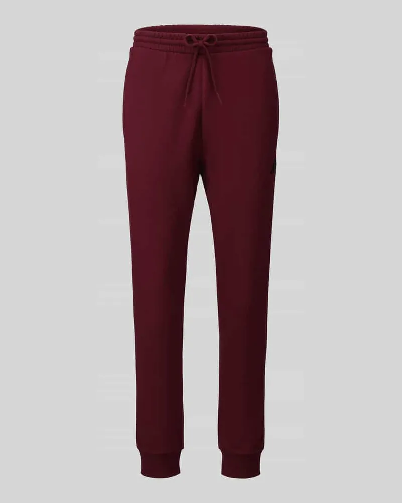 adidas Regular Fit Sweathose aus Baumwoll-Mix Modell 'FEELCOZY Dunkelrot