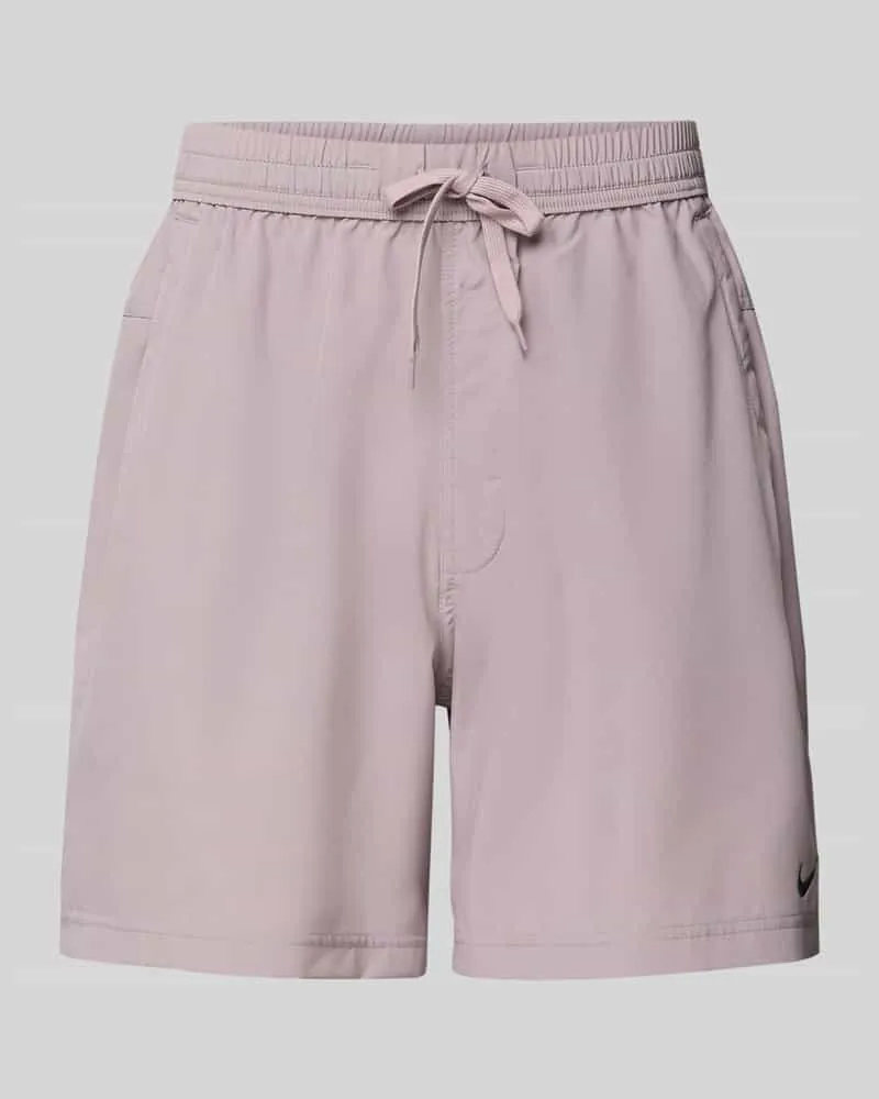 Nike Shorts mit Logo-Print und Eingrifftaschen Lila