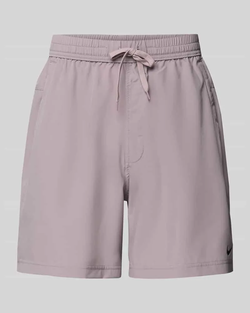 Nike Shorts mit Logo-Print und Eingrifftaschen Lila