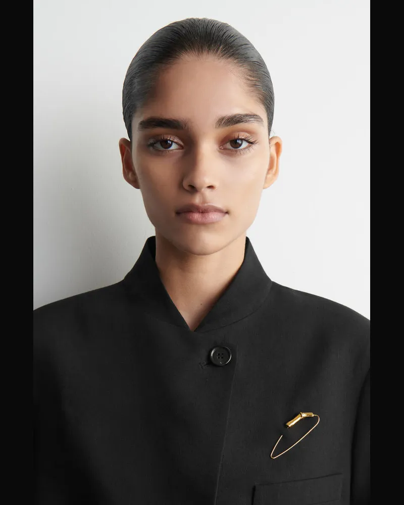 COS Skulpturale Brosche Goldfarben