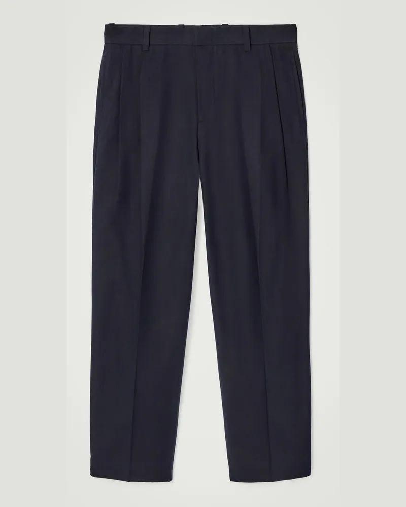 COS Lockere, Schmal Zulaufende Baumwollhose Mit Falten Blau