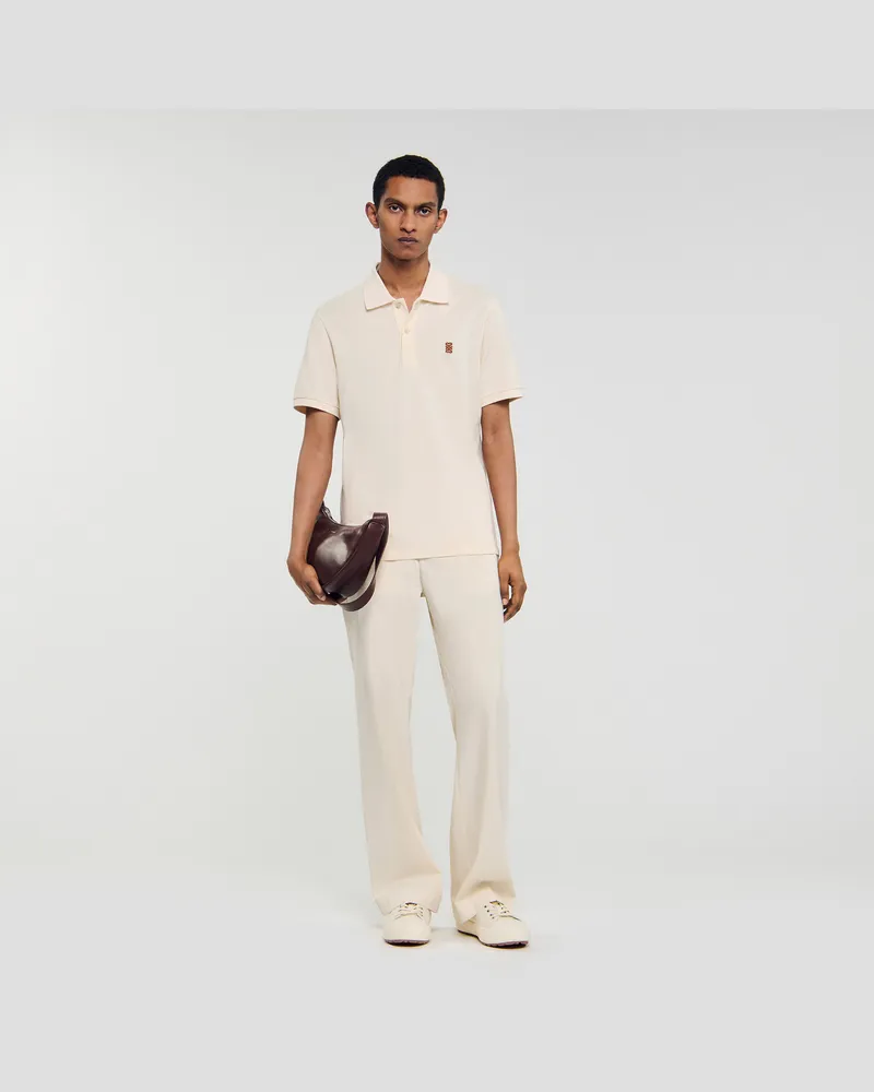 Sandro Poloshirt mit Leder-Logo Butter