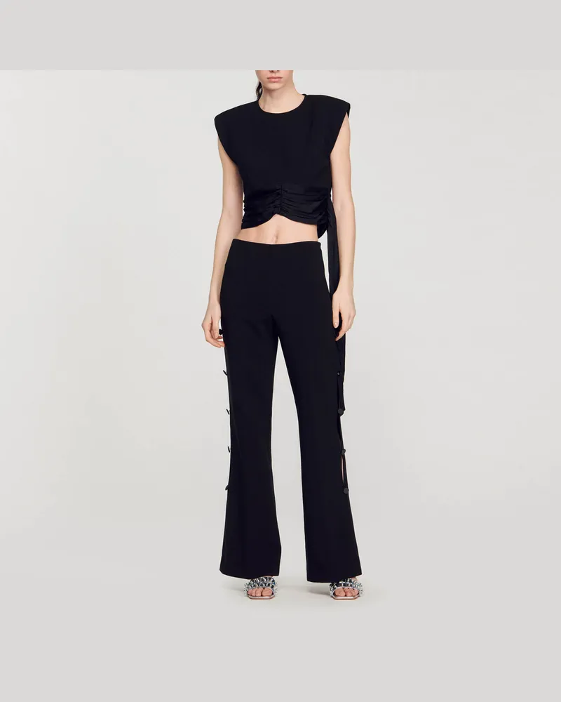 Sandro Ausgestellte Hose mit Seitenschlitzen Schwarz