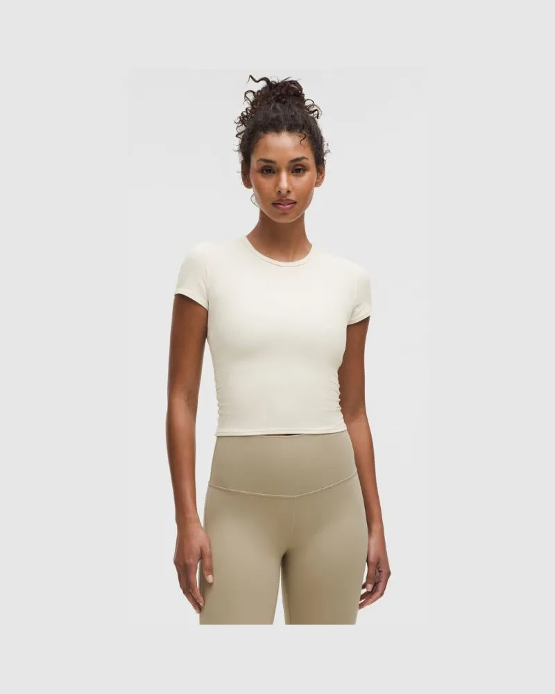 LULULEMON All It Takes Geripptes Kurzarmshirt mit Twist-Detail auf der Rückseite für Frauen – Größe in Light Ivory Light
