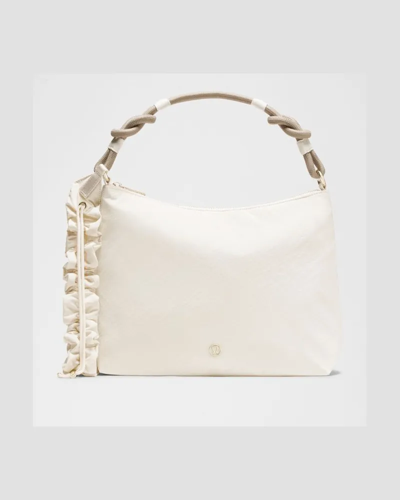 LULULEMON Wandelbare, raffbare Umhängetasche 6 Größe in Light Ivory/Warm Ash Grey Light