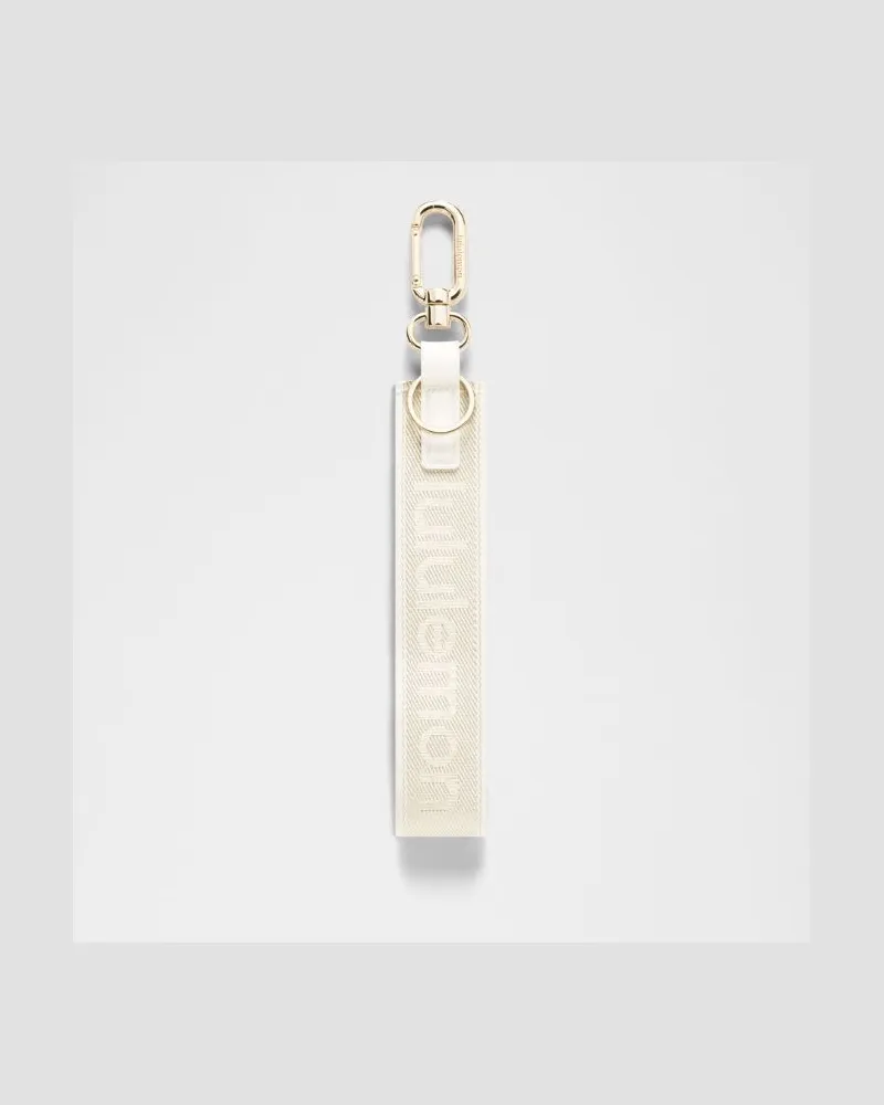 LULULEMON Never Lost Keychain Metallic Wordmark in Light Ivory Light