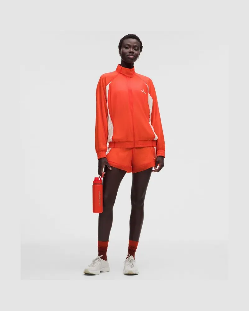 LULULEMON License to Train Texturierte Nylonjacke für Frauen – Größe in Cherry Ember/Light Ivory Cherry