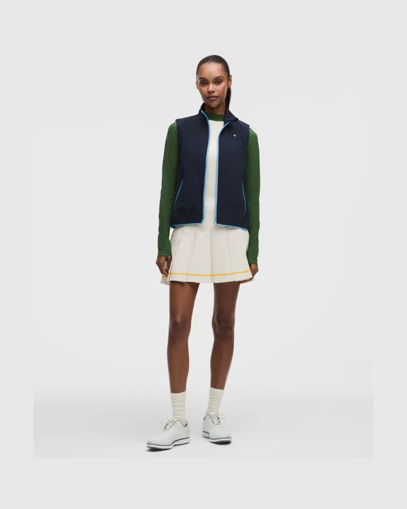 LULULEMON A-linienförmiger Golfrock mit hohem Bund und Kellerfalte für Frauen – Größe in Light Ivory/Buttercup Light