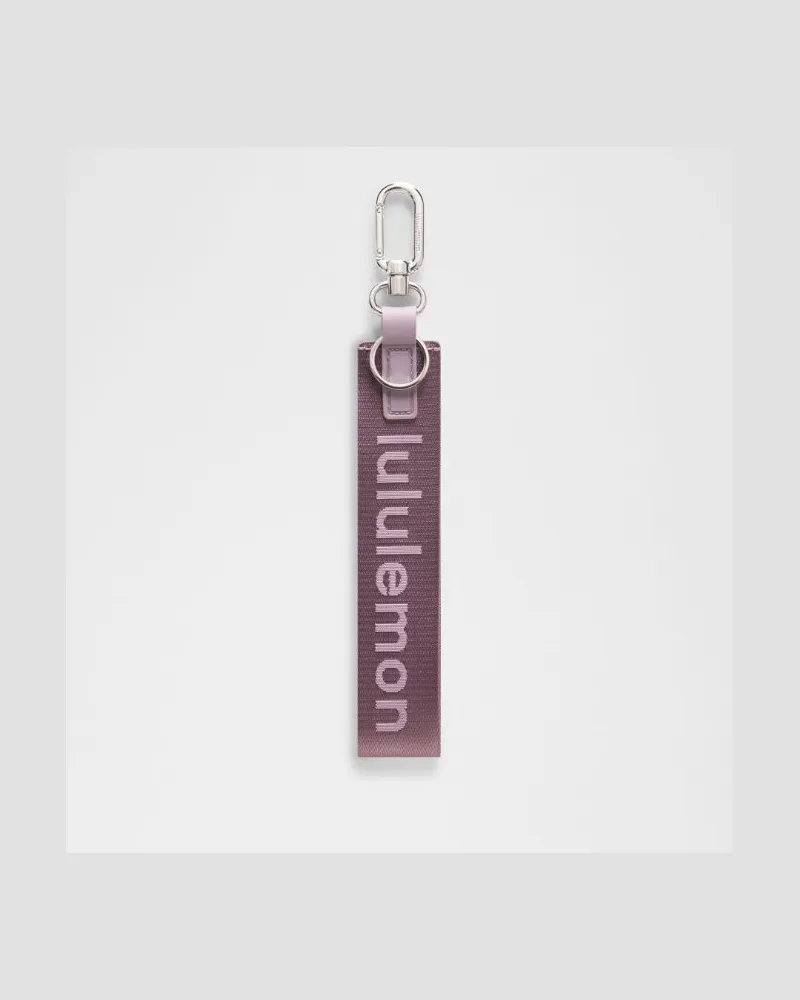 LULULEMON Never Lost Schlüsselanhänger in Lotus Lavender/Lilac Play/Silver Lotus