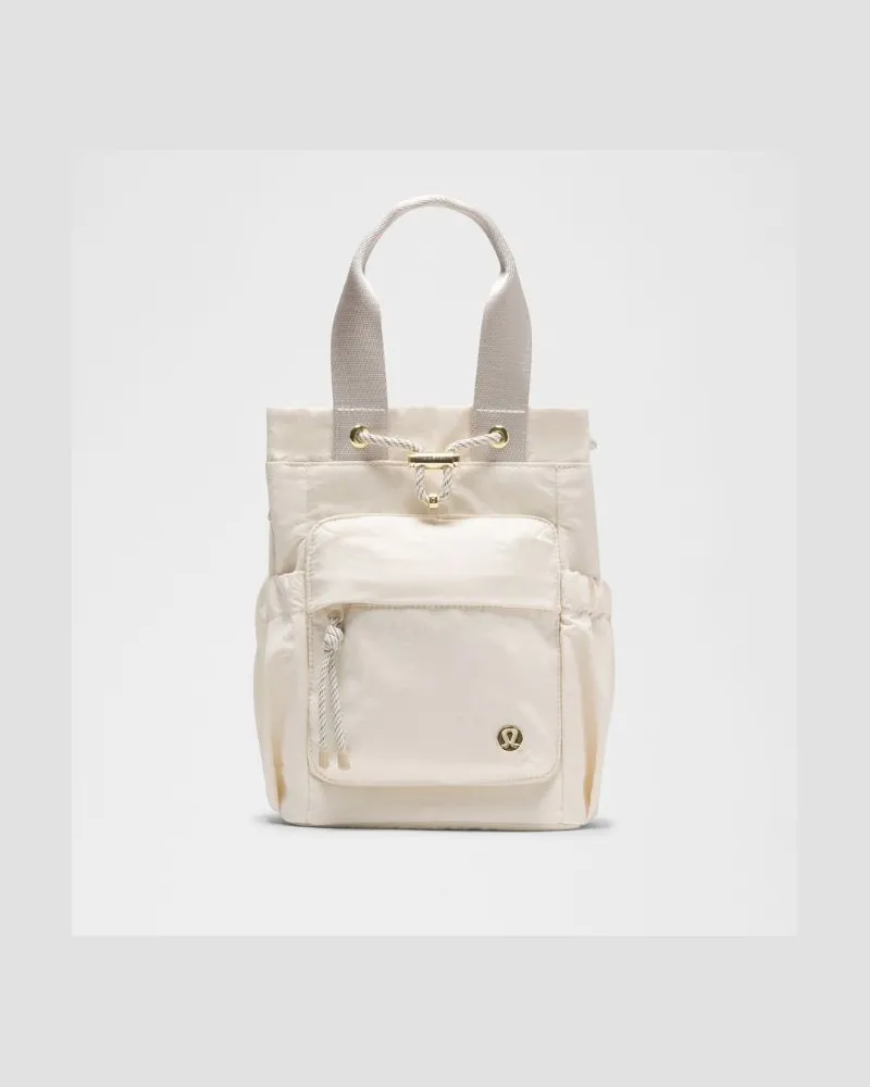 LULULEMON Wandelbare Mini-Bucket-Bag mit Kordelzug Größe in Light Ivory/Wacky Khaki/Gold Light