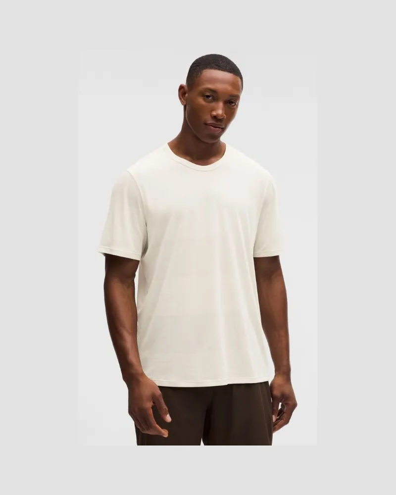 LULULEMON Fast and Free Kurzarmshirt Perforierte Streifen für Männer – Größe in Light Ivory Light