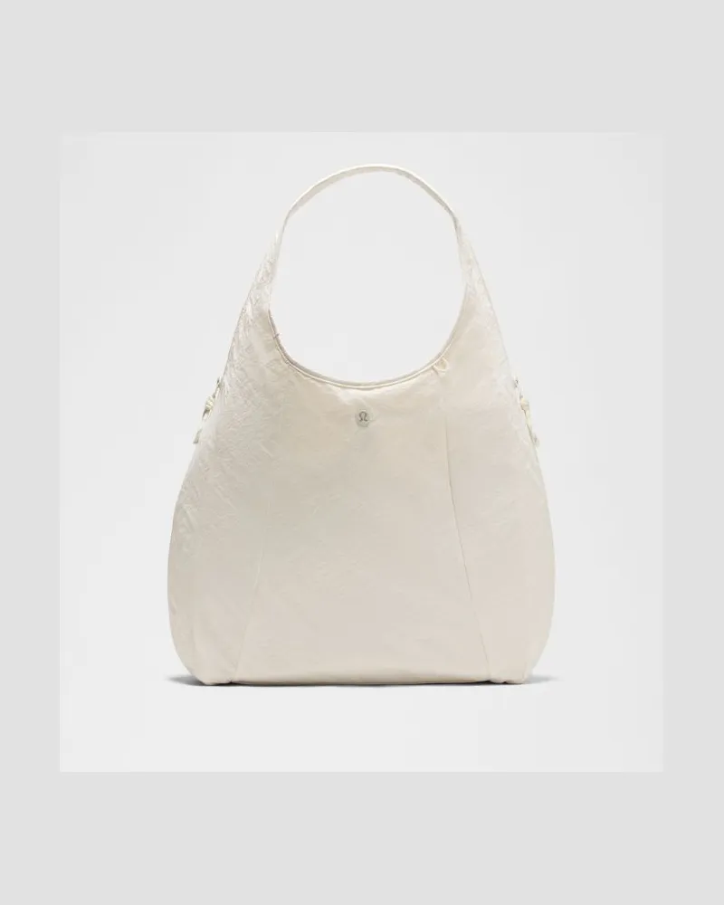 LULULEMON Lässige Slouchy-Schultertasche Größe in Light Ivory Light