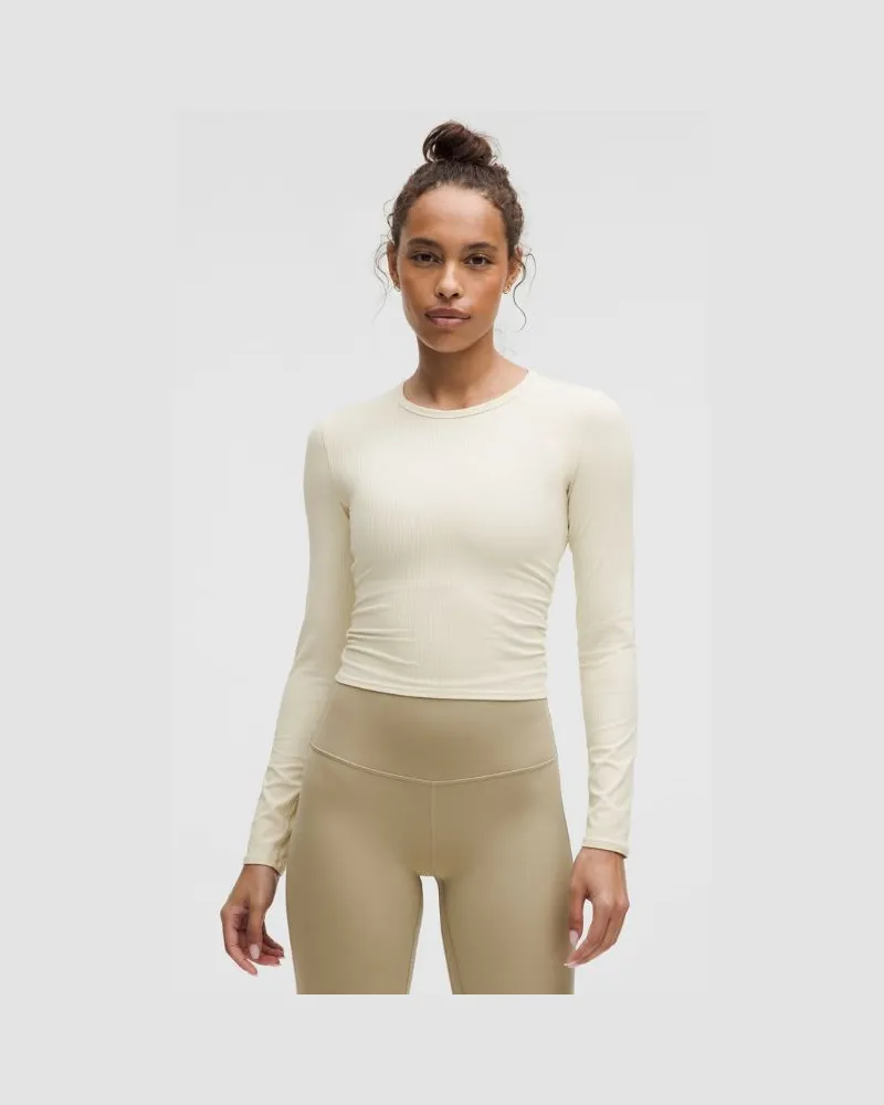 LULULEMON All It Takes Geripptes Langarmshirt mit Twist-Detail für Frauen – Größe in Light Ivory Light