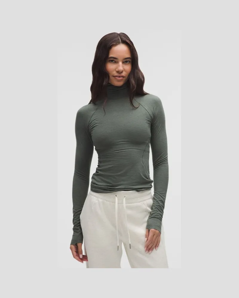LULULEMON Wool-Blend Turtleneck Base Layer für Frauen – Größe in Palm Deco/Rainforest Green Palm