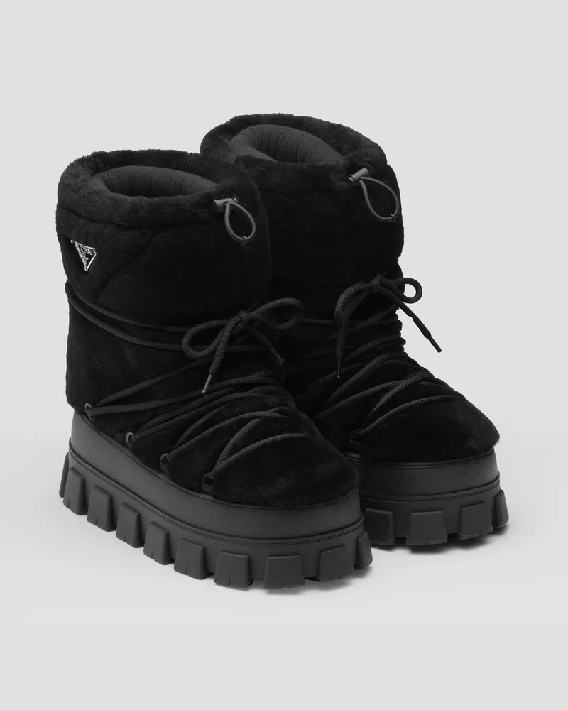 Prada Après-Ski-Stiefeletten aus Lammfell Schwarz