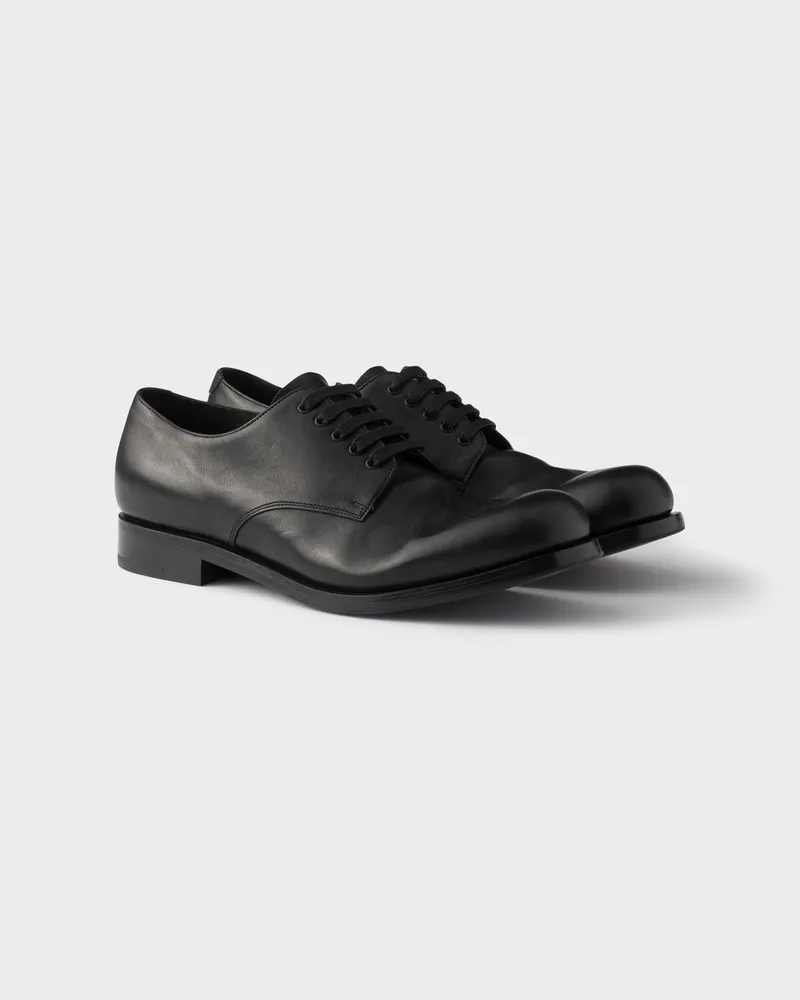 Prada Schnürschuhe aus antikisiertem Leder Schwarz
