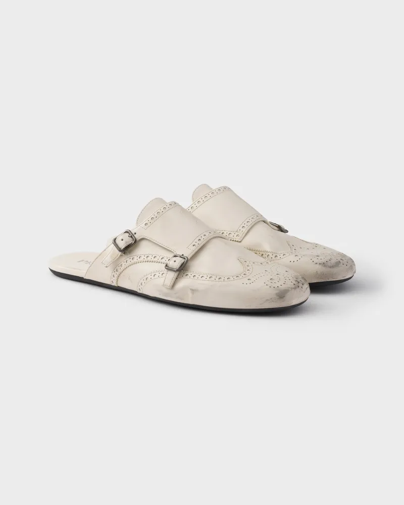 Prada Shuffle Double-Monkstrap-Mules aus Leder in Antik-Optik Kalkweiss