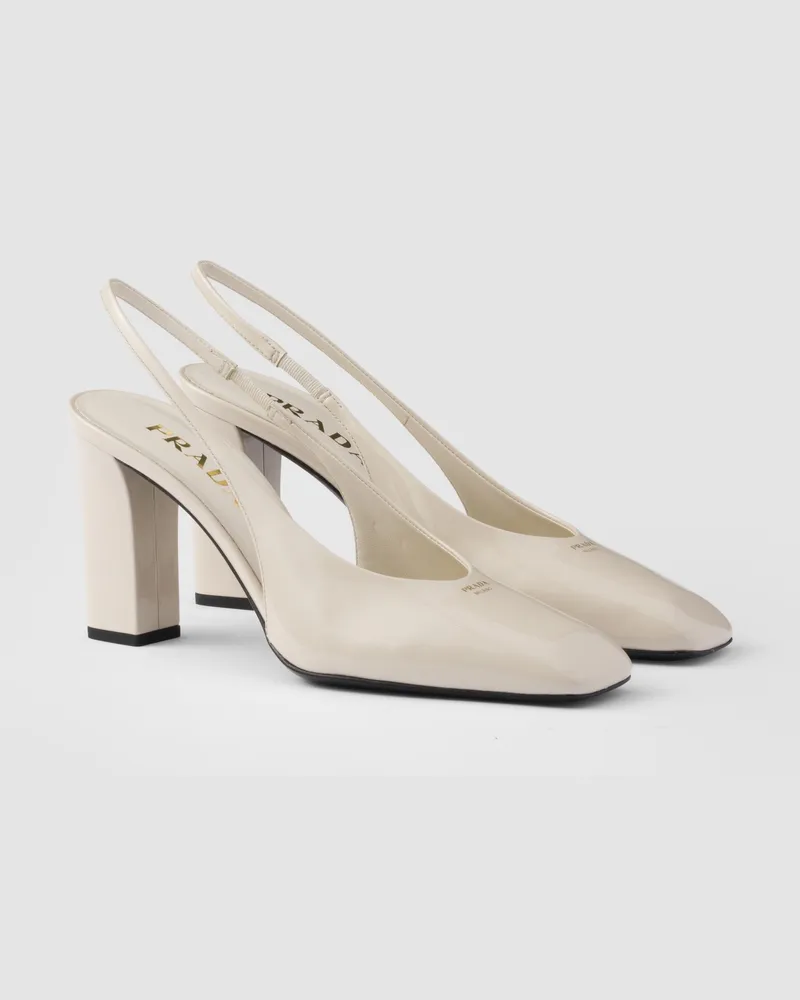 Prada Slingback-Pumps aus Lackleder Elfenbein