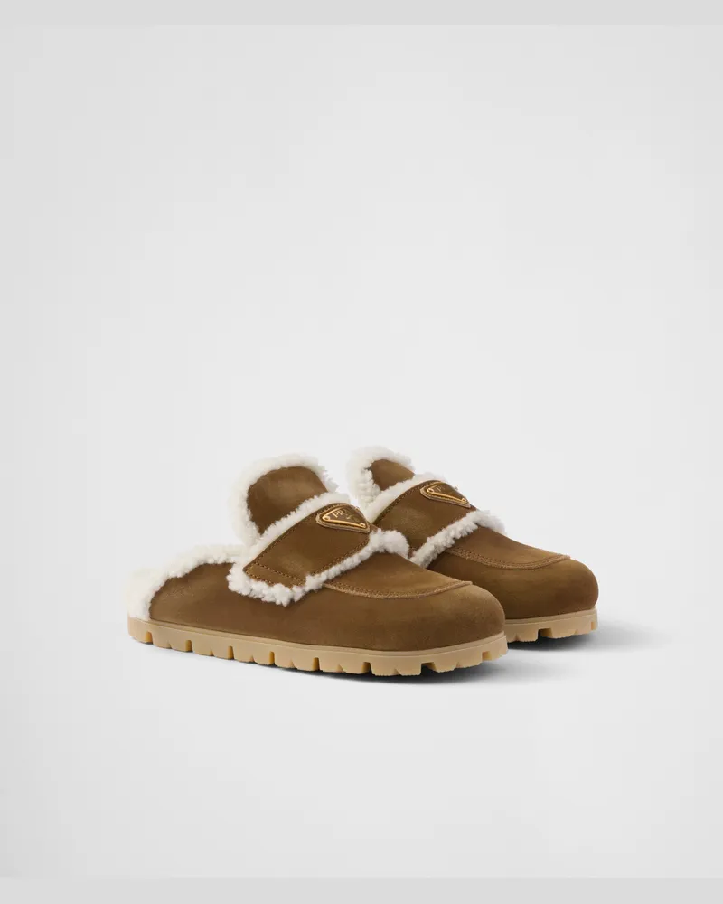 Prada Slipper aus Wildleder und Lammfell Zimt