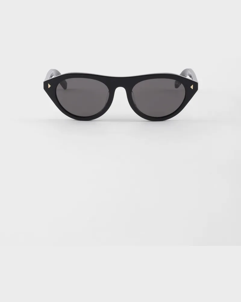 Prada Sonnenbrille mit der ikonischen Metallplakette Gläser