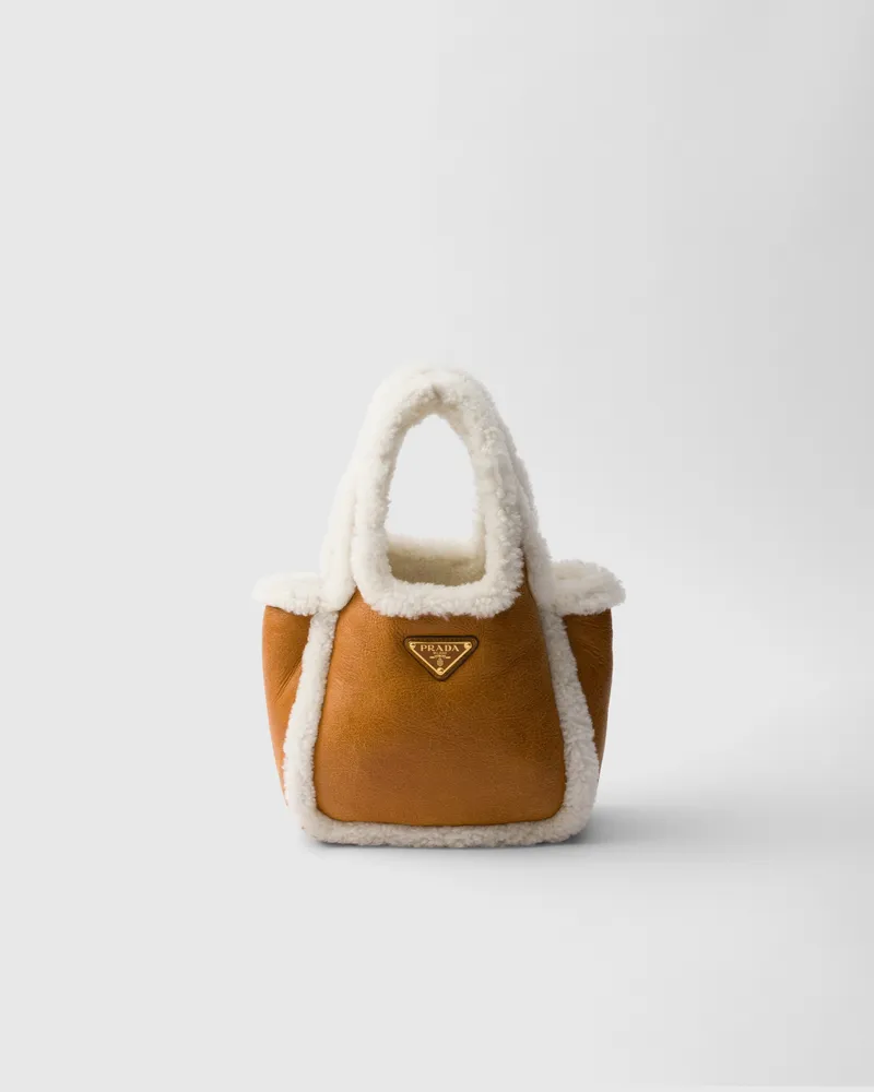 Prada Mini-Handtasche aus Lammfell Cognac