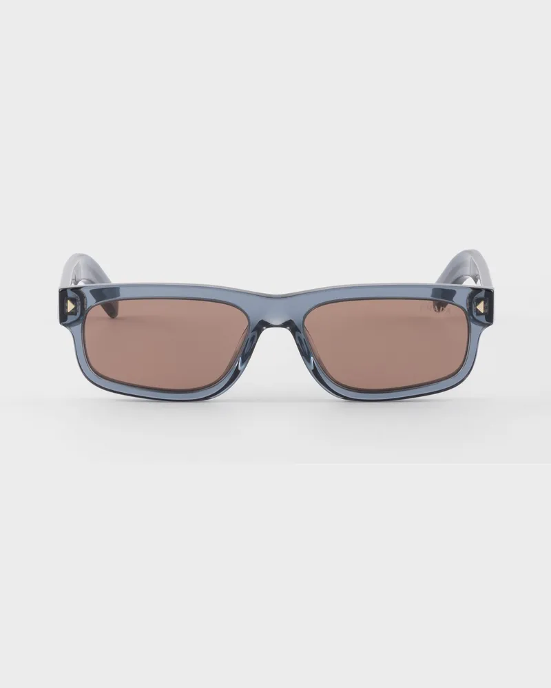 Prada Sonnenbrille mit der ikonischen Metallplakette Dunkelbraun