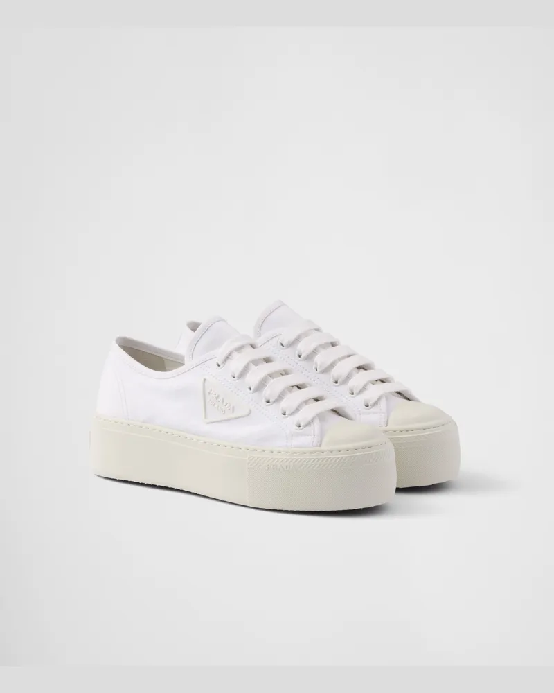 Prada Geschnürte Sneaker aus Stoff Weiss